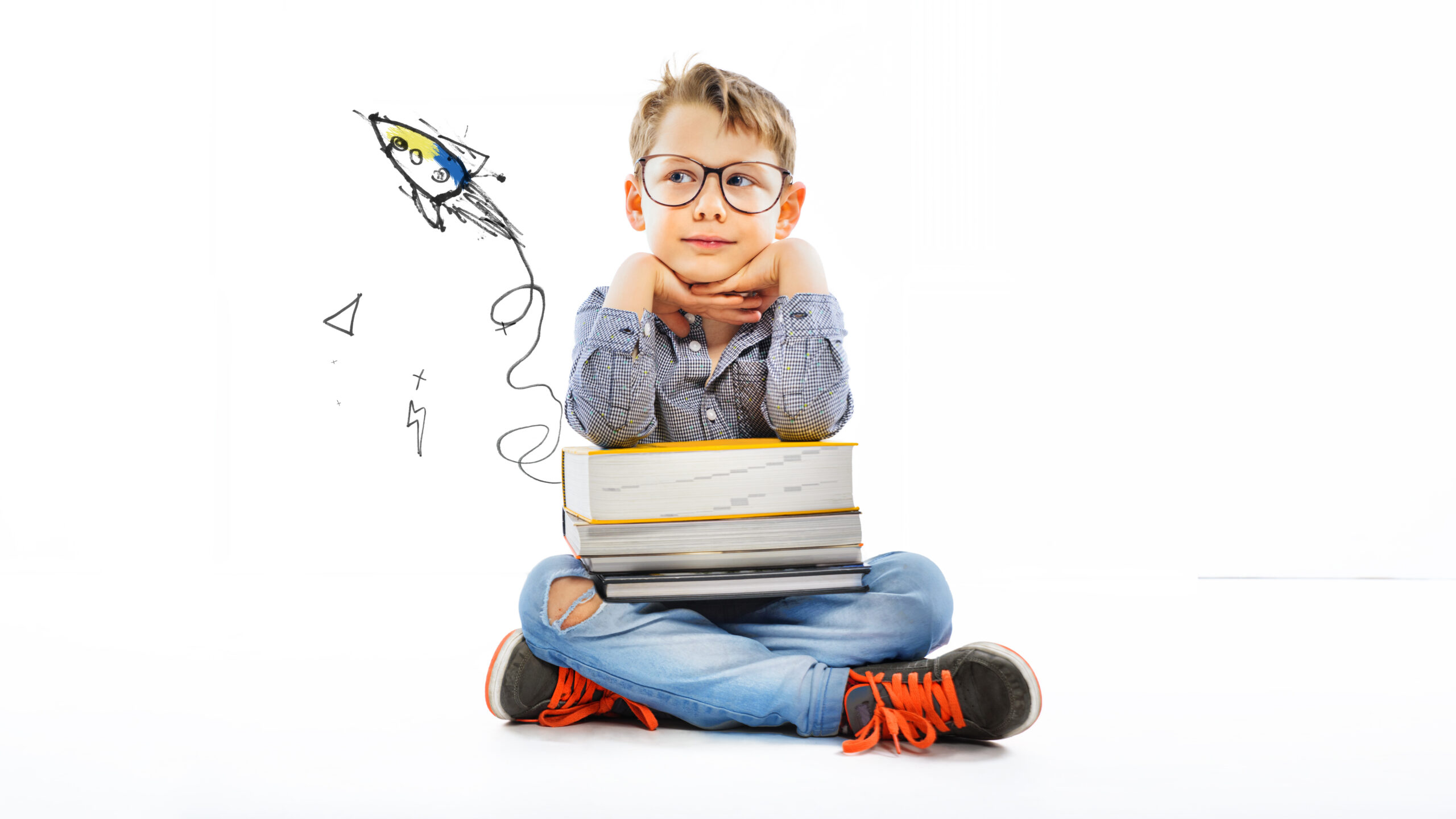 Preschooler with books ready for school - big dream for the futu